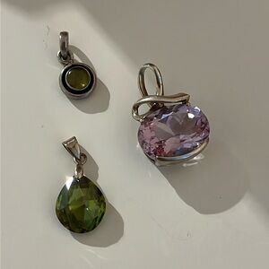Silver pendants with stones